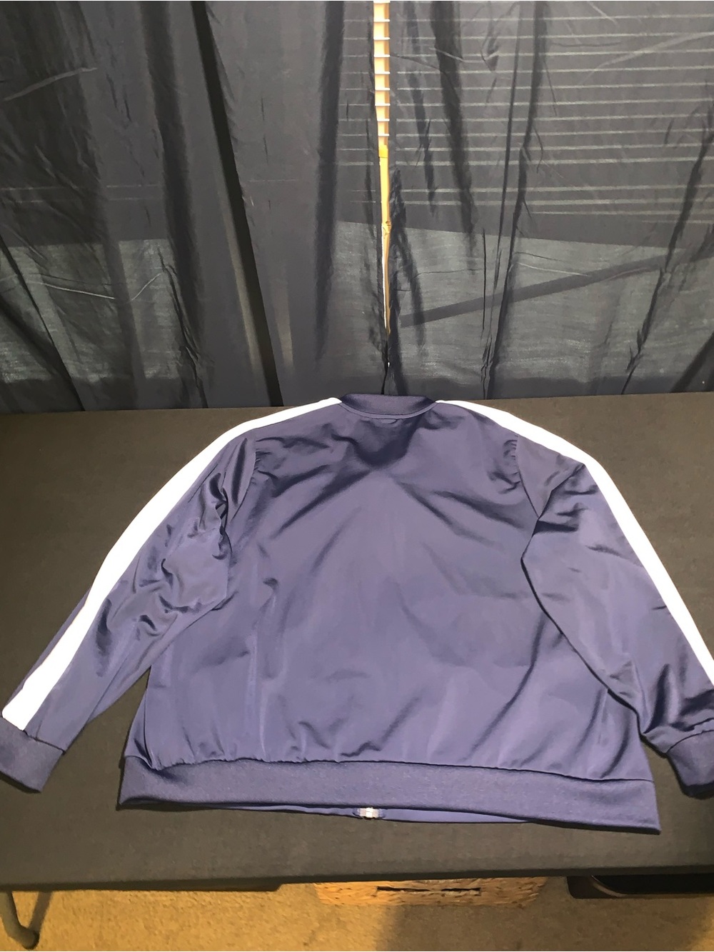 Woman’s Navy Blue Track Jacket with White Sleeve Stripes